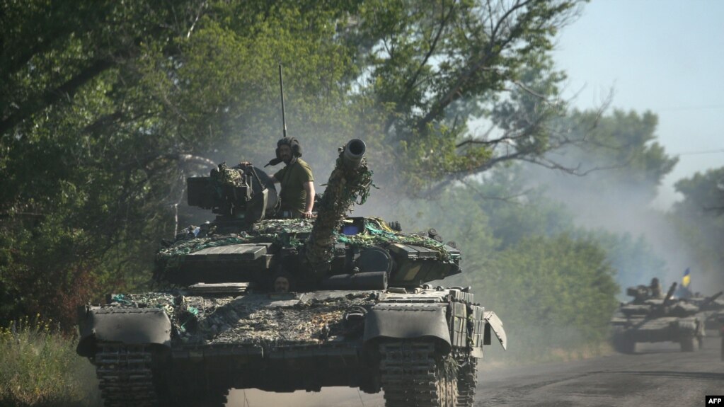 Фото: танки на Донбасі, 21 червня 2022 року. (Photo by Анатолій Степанов / AFP)
