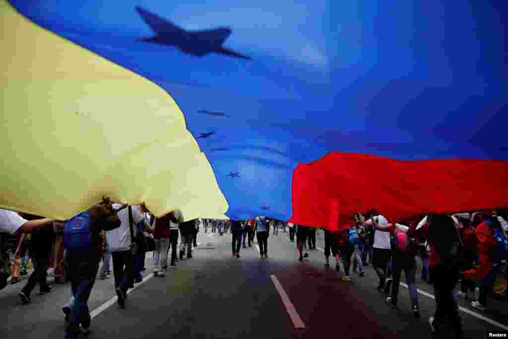 Opposition supporters attend a rally against Venezuelan President Nicolas Maduro&#39;s government, in Caracas.