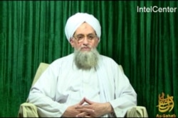 FILE - This still image from video obtained courtesy of IntelCenter shows Al-Qaeda leader Ayman al-Zawahiri appearing in a new al-Qaida video released Oct. 11, 2011.
