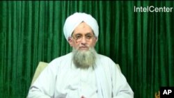 This still image from video obtained courtesy of IntelCenter shows Al-Qaeda leader Ayman al-Zawahiri appearing in a new Al-Qaeda video released October 11, 2011.
