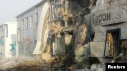 Вигляд пошкодженої будівлі після атаки українського безпілотника в Єлабузі, Татарстан, Росія. 2 квітня 2024 року. REUTERS