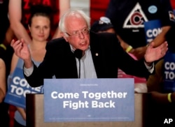 FILE - U.S. Sen. Bernie Sanders, I-Vt, speaks at a Democratic National Committee rally, April 21, 2017, in Mesa, Ariz.