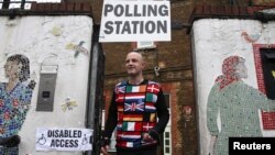 A man wearing a European themed cycling jersey leaves after voting at a polling station for the Referendum on the European Union in north London, Britain, June 23, 2016. 
