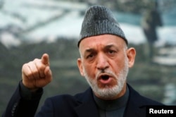 Afghan President Hamid Karzai speaks during a news conference in Kabul, May 4, 2013.