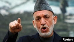 Afghan President Hamid Karzai speaks during a news conference in Kabul, May 4, 2013.