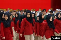 FILE - Students of an Imam Hatip high school march during a Republic Day ceremony in Ankara, Turkey.