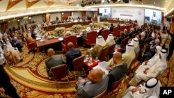 Foreign officials meet for the opening session of the Economic and Social Council of the Arab League Ministers in Kuwait City, March 22, 2014, ahead of the 25th Arab summit in Kuwait, March 25-26.