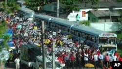 Sri Lankans led by Marxist party People's Liberation Front protest in Hambantota, about 230 kilometers south east of Colombo, Sri Lanka, Jan. 5, 2017. Hundreds protested the Sri Lankan government's plan to lease a southern seaport to a Chinese-controlled joint venture in exchange for the heavy loans to build the port. 