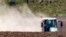 The hot air shimmers in front of a tractor during a long time of drought near Bad Lauchstaedt, Germany, April 27, 2020. 