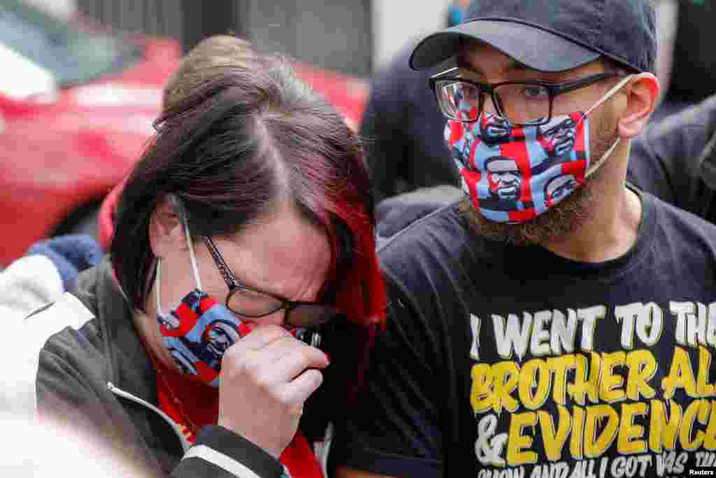 Courtney Ross, George Floyd&#39;s girlfriend, cries as the verdict announcement is expected in the trial of former Minneapolis police officer Derek Chauvin, who is facing murder charges.