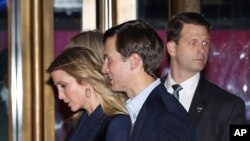 Ivanka Trump and her husband Jared Kushner walk past the Paley Center for Media as they leave the 21 Club after dining with President-elect Donald Trump on Nov. 15, 2016, in New York.