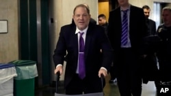 Harvey Weinstein arrives at court for his rape trial, in New York, Feb. 4, 2020.