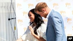 Prince Harry and Meghan visit a Youth Employment Services Hub in Makhulong, Tembisa, a township near Johannesburg, South Africa, Oct. 2, 2019. 