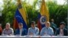 Delegaciones del ELN y del gobierno colombiano, en conferencia de prensa luego de celebrar la última ronda de conversaciones de paz con el gobierno de Colombia para este año, en Caracas, Venezuela, el 12 de diciembre de 2022.