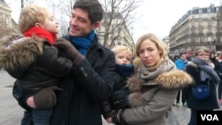 Antoine Karegis and family, Place de la Republique, January 10, 2016. (Lisa Bryant/VOA)