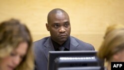 Germain Katanga, a Congolese National, sits during his trial at the International Criminal Court (ICC) in the Hague, May 23, 2014.