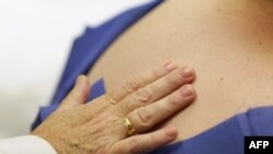 Dr. Antonella Tost, Dermatologist University of Miami School of Medicine, examines Michael Casa Nova,12, for symptoms of skin cancer due to sun exposure, June 15, 2011.