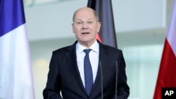 German Chancellor Olaf Scholz talks to the media in Berlin on March 15, 2024. Scholz on March 16 urged Israel to allow much more access to Gaza for humanitarian aid.