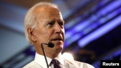 FILE - Former U.S. Vice President Joe Biden campaigns for Democratic U.S. congressional candidate Mikie Sherrill at Montclaire State University in Montclair, New Jersey, Sept. 5, 2018.