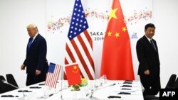 2019年6月29日美国总特朗普(左)和中国国家主席习近平(右)在G20大阪峰会。