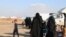 Wives and children of IS fighters are detained in al-Hol Camp in Syria, Feb. 18, 2020. (Heather Murdock/VOA)