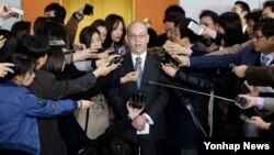 U.S. Assistant Secretary of State for East Asian and Pacific Affairs Daniel Russel, center, speaks to the media after his meeting with South Korean senior officials at the Foreign Ministry in Seoul, South Korea, Tuesday, March 17, 2015. 