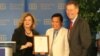 Sok Khemara, VOA Khmer staff (middle) receives David Burke Distinguished Journalism Awards, an annual award presented by the Broadcasting Board of Governors.