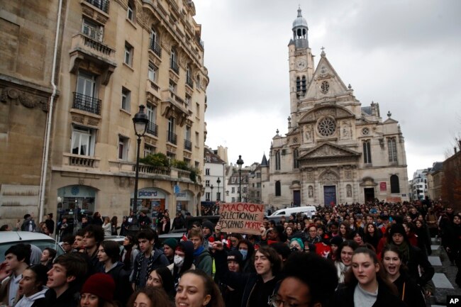 Students opposing changes in key high school tests demonstrate Dec.11, 2018 in Paris.