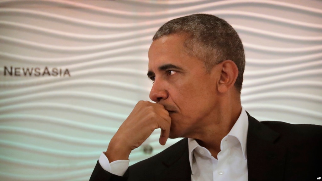 Former U.S. President Barack Obama listens to a question during a leadership summit in New Delhi, India, Dec. 1, 2017. 