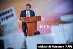 Kremlin spokesman Dmitry Peskov looks on during President Vladimir Putin's annual press conference in Moscow, December 14, 2017.