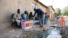 A voter casts his ballot at a polling station in N'Djamena, Chad, on Dec. 29, 2024 during the country's local, provincial and legislative elections.