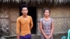 La Moi, 25, and Kaw Nan, 28, whose father was jailed for resisting a land grab near Myitkyina, Kachin State. (P. Vrieze for VOA)