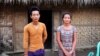 La Moi, 25, and Kaw Nan, 28, whose father was jailed for resisting a land grab near Myitkyina, Kachin State. (P. Vrieze for VOA)