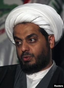 Iraq's Shi'ite militia leader Qais al-Khazali, the leader of Asaib al-Haq, speaks to Reuters during an interview in Baghdad, Iraq, January 4, 2012.