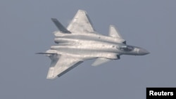 China unveils its J-20 stealth fighter during an air show in Zhuhai, Guangdong Province, China, Nov. 1, 2016. 