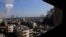 A still image taken from a video uploaded to a social media website, on Feb. 25, 2017, purports to show air strikes in the rebel-held al-Waer area of Homs, Syria. 