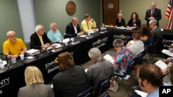 Johnson County chief council Don Jarrett speaks during the Johnson County Board of Canvassers meeting, Aug. 13, 2018, in Olathe, Kansas.