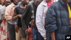 People enactment     up   to person   nutrient  astatine  a structure  for families displaced by pack  unit   successful  the Kenscoff vicinity  of Port-au-Prince, Haiti, Feb. 3, 2025.