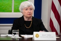 FILE - Treasury Secretary Janet Yellen listens during a meeting on the White House campus, Oct. 6, 2021.