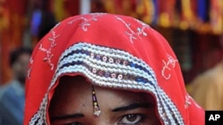 Child bride at the Balaji temple in Kamkheda village, in the western Indian state of Rajasthan, May 7, 2011