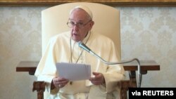 FILE - Pope Francis speaks during a meeting with the Committee of Experts of the Council of Europe at the Vatican, Oct. 8, 2020, in this still image taken from a video. 