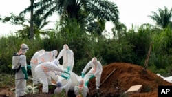 FILE: Ebola victim being buried. Health authorities in Uganda on 9.20. 2022 reported that a man who died a day earlier had tested positive for the virus that causes Ebola and referred to a potential new outbreak.