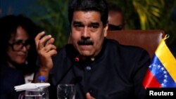 Venezuela's President Nicolas Maduro speaks at the IV Gas Exporting Countries Forum in Santa Cruz, Bolivia, Nov. 24, 2017.