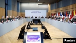 French President Emmanuel Macron attends a meeting with the chiefs of staff of the European Union and NATO armies on the conflict in Ukraine at the Musee de la Marine in Paris, France, March 11, 2025.