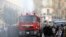 Egyptian riot police fire a water cannon to disperse people protesting against a new law restricting demonstrations, in downtown Cairo, Nov. 26, 2013. 