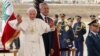 Pope Benedict XVI waves upon his arrival at Beirut international airport as he is welcomed by Lebanon's President Michel Suleiman, September 14, 2012. 