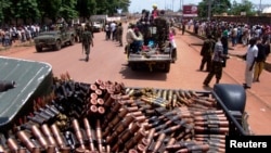 Armed Seleka rebel alliance fighters patrol streets in pickup trucks to stop looting, Bangui, Central African Republic, March 26, 2013.