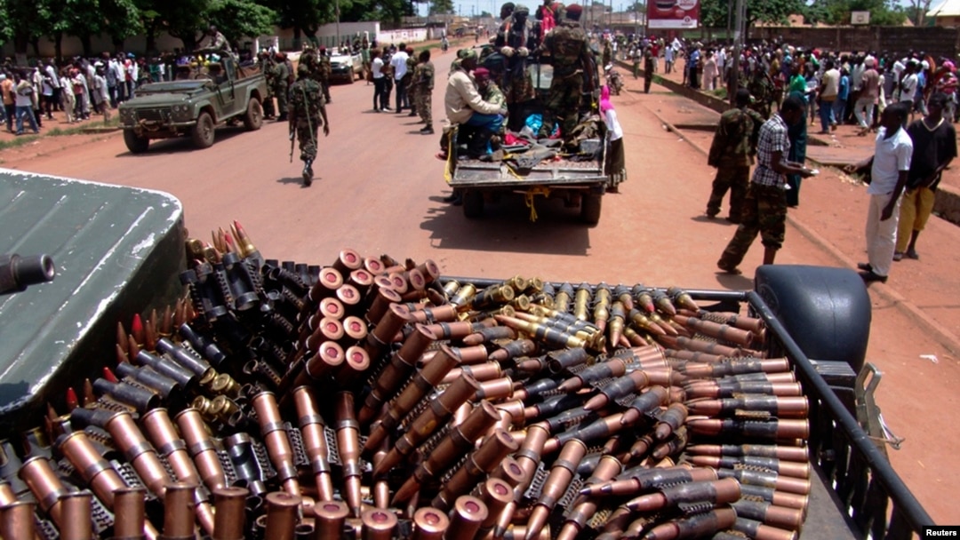 Armed Seleka rebel alliance fighters patrol streets in pickup trucks to stop looting, Bangui, Central African Republic, March 26, 2013.