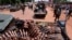 Armed Seleka rebel alliance fighters patrol streets in pickup trucks to stop looting, Bangui, Central African Republic, March 26, 2013.