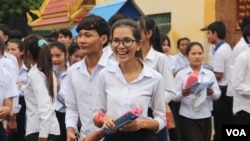 Students walk out of Santhormok examination center on the first day of grade 12 examination, on August 24th, 2015. This is the second year that high school examination has been tighten since new Education Minister, Hang Choun Naron started his office in o
